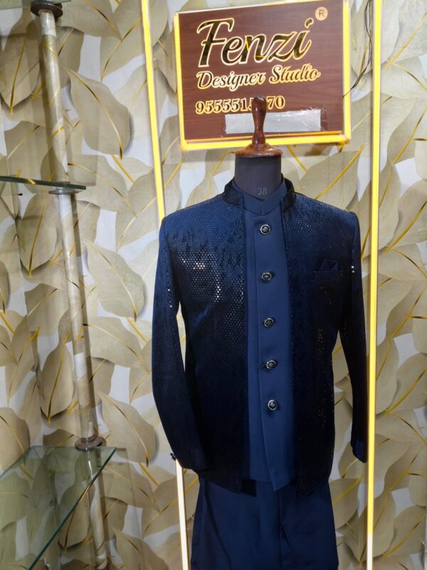 Step into timeless elegance with Fenzi’s Midnight Blue Textured jodhpuri Suit — a fusion of classic charm and modern craftsmanship, designed to make you stand out at every festive or wedding occasion.