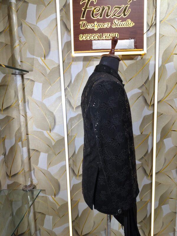 Black embroidered Jodhpuri jacket set with elegant floral detailing displayed on a mannequin at Fenzi Designer Studio.