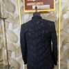 Black embroidered Jodhpuri jacket set with elegant floral detailing displayed on a mannequin at Fenzi Designer Studio.