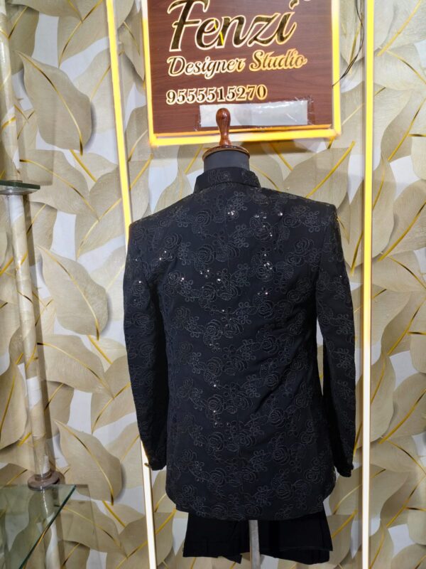 Black embroidered Jodhpuri jacket set with elegant floral detailing displayed on a mannequin at Fenzi Designer Studio.