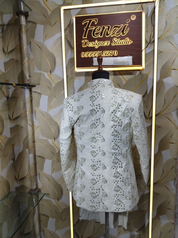 Step into timeless elegance with this Ivory Embroidered Floral Jodhpuri Set by Fenzi Designer Studio — a perfect blend of regal charm and modern sophistication.