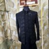 Black embroidered Jodhpuri jacket set with elegant floral detailing displayed on a mannequin at Fenzi Designer Studio.