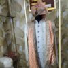 Elegant peach and white sherwani with embellished turban and dupatta displayed at Fenzi Designer Studio.