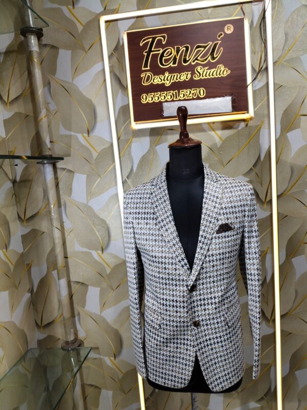 Elegant houndstooth designer blazer displayed at Fenzi Designer Studio.