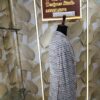Elegant houndstooth designer blazer displayed at Fenzi Designer Studio.