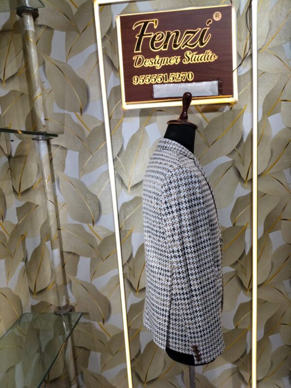Elegant houndstooth designer blazer displayed at Fenzi Designer Studio.