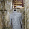 Elegant houndstooth designer blazer displayed at Fenzi Designer Studio.