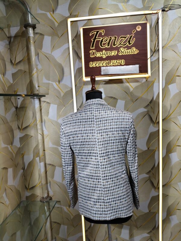 Elegant houndstooth designer blazer displayed at Fenzi Designer Studio.