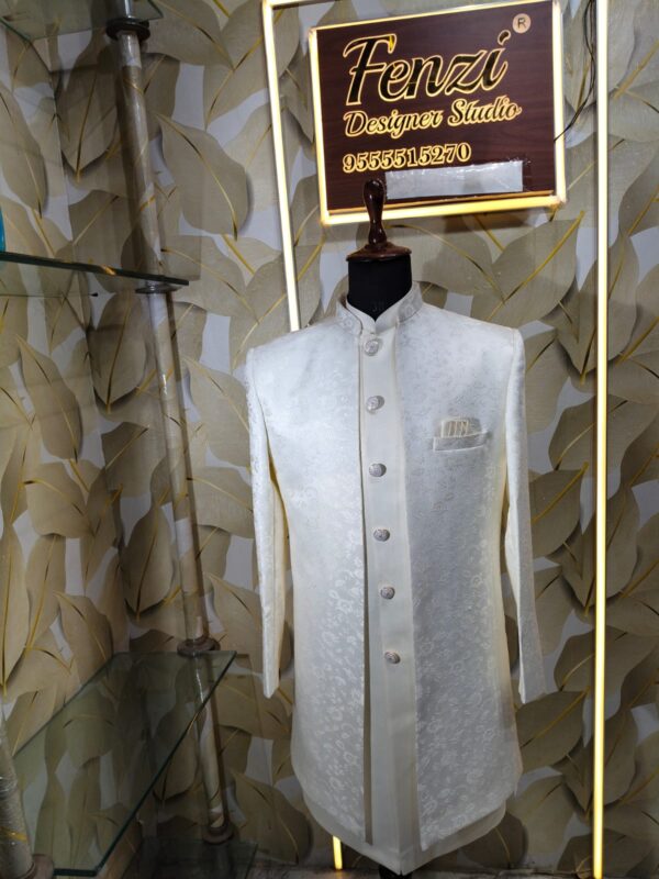 Elegant white designer sherwani with intricate embroidery