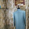 Elegant pastel blue designer sherwani with embossed diamond pattern
