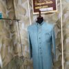 Elegant pastel blue designer sherwani with embossed diamond pattern