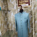 Elegant pastel blue designer sherwani with embossed diamond pattern