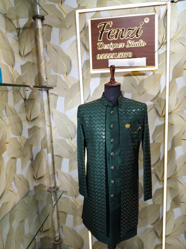 Dark green designer sherwani with zigzag pattern and golden buttons displayed