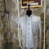 “Elegant ivory embroidered Jodhpuri suit displayed on a mannequin at Fenzi Designer Studio.”