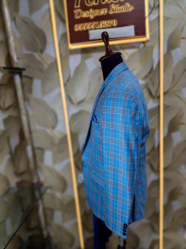 Step into refined sophistication with the Azure Checkered Elegance Suit — crafted for men who appreciate timeless class with a modern edge. Perfect for weddings, receptions, and high-profile events. Elevate every moment with unmatched style.