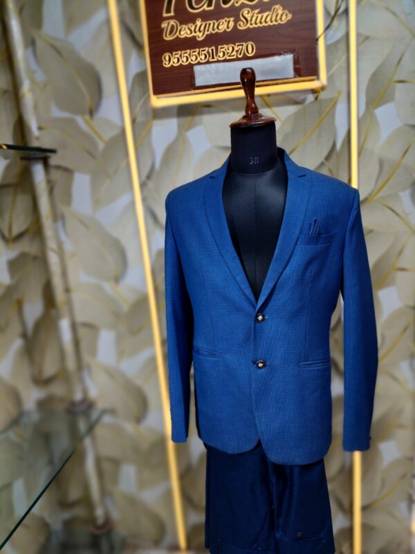 “Redefine sophistication with the Royal Sapphire Suit — crafted for men who believe in timeless elegance and effortless class.”