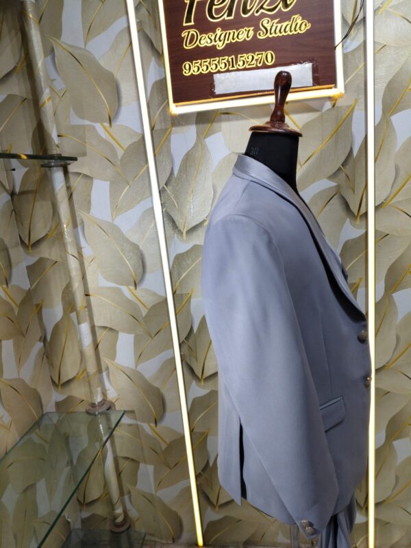 “Step into sophistication with the Platinum Grey 3-Piece Suit — crafted for men who define elegance with every step.”