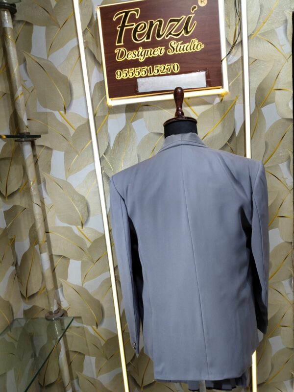 “Step into sophistication with the Platinum Grey 3-Piece Suit — crafted for men who define elegance with every step.”