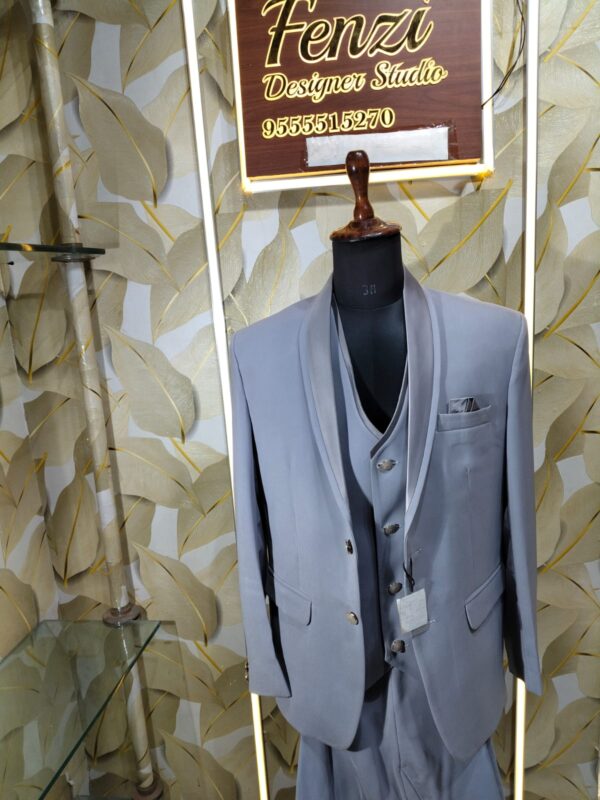 “Step into sophistication with the Platinum Grey 3-Piece Suit — crafted for men who define elegance with every step.”