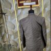 Men’s designer 3-piece suit with a brown micro-check blazer and navy blue waistcoat displayed on a mannequin at Fenzi Designer Studio.”