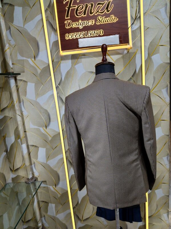 Men’s designer 3-piece suit with a brown micro-check blazer and navy blue waistcoat displayed on a mannequin at Fenzi Designer Studio.”
