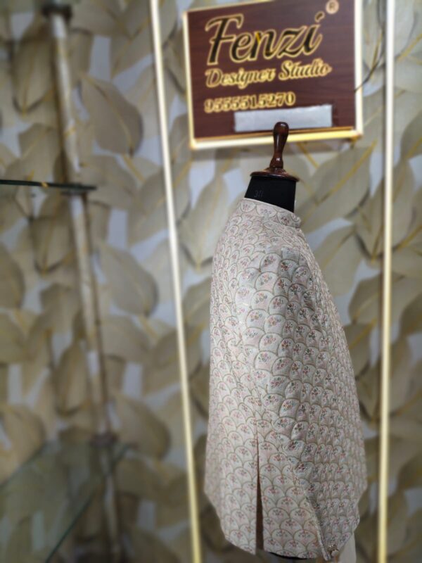 “Elegance Reimagined — Step into timeless sophistication with our Ivory Embroidered Jodhpuri Suit, crafted for men who appreciate heritage, luxury, and a distinct royal aura.”