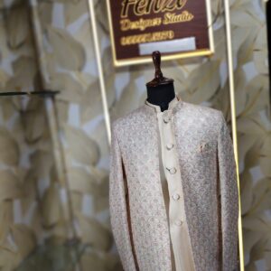 “Elegance Reimagined — Step into timeless sophistication with our Ivory Embroidered Jodhpuri Suit, crafted for men who appreciate heritage, luxury, and a distinct royal aura.”