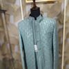 “Elegance Reimagined — Step into regal sophistication with our Mint Green Textured Jodhpuri Suit, crafted for men who appreciate timeless luxury.”