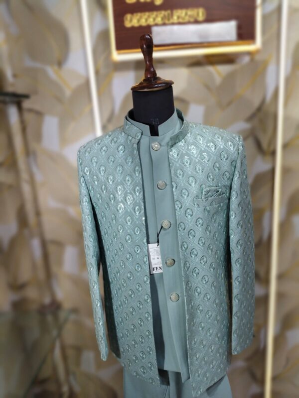 “Elegance Reimagined — Step into regal sophistication with our Mint Green Textured Jodhpuri Suit, crafted for men who appreciate timeless luxury.”