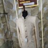 Cream-gold designer Jodhpuri suit on a mannequin